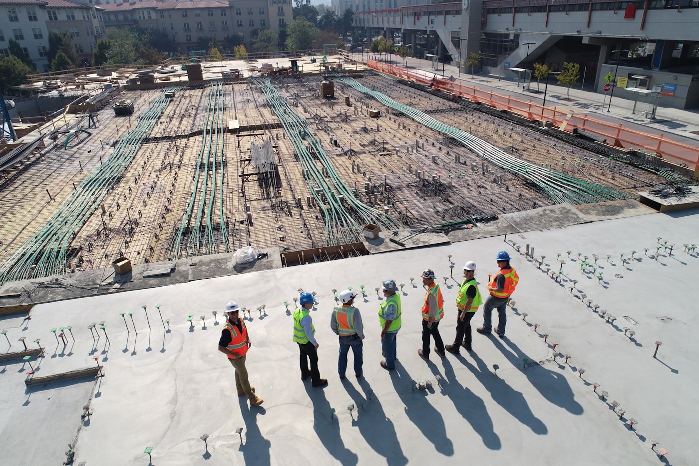 Construction crew reviewing a project on site